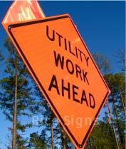 Utility Work Ahead Sign with Orange Warning Flags