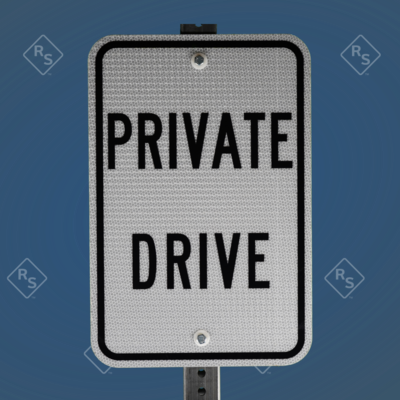 A 360 degree view of a sign that warns people they are entering a private drive