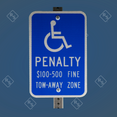 A 360 degree view of a handicap symbol sign that has the fine amount and penalty of 100 to 500 dollars.  It also informs that the area is a two-away zone