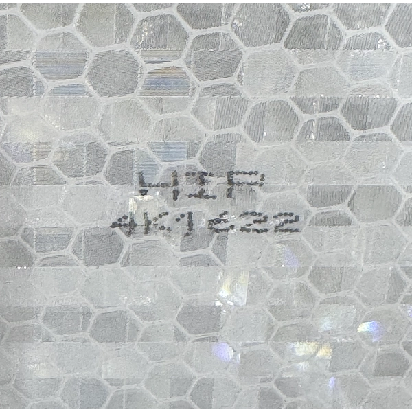 Close-up of Avery Dennison T-6500 microprismatic reflective sheeting texture, white