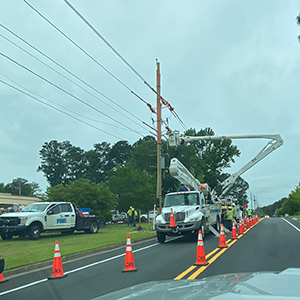 A construction workzone that is lined with custom traffic cones