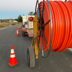 A construction vehicle that is protected with cones