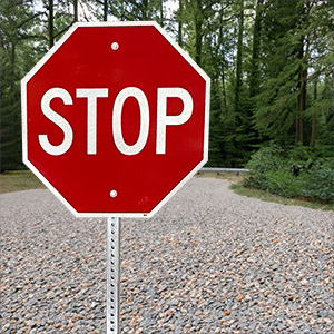 Picture of the back of a 30 inch stop sign that shows where the holes are located. 