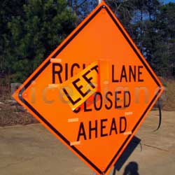 Velcro around the words on our Right Lane Closed Ahead roll-up sign. Roll-up sign overlays are sold separately from sign.  See part # RPL for Left overlay and RPC for Center overlay.