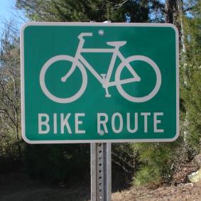 Our 24"x18" Bike Route Road Sign shown on a u-channel highway sign post (highway sign post and hardware are sold separately).