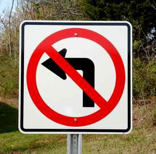 Our No Left Turn sign pictured on a galvanized u-channel post.