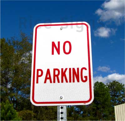 Pictured: A 12"x18" No Parking sign with optional portable post and base.