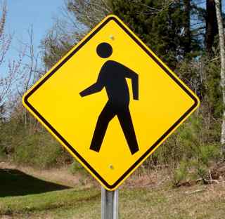 Our pedestrian crossing street sign with optional post. The pedestrian road sign is shown with yellow high intensity reflective.