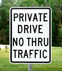 Our 18"x24" Private Drive No Thru Traffic sign shown on optional sign post.