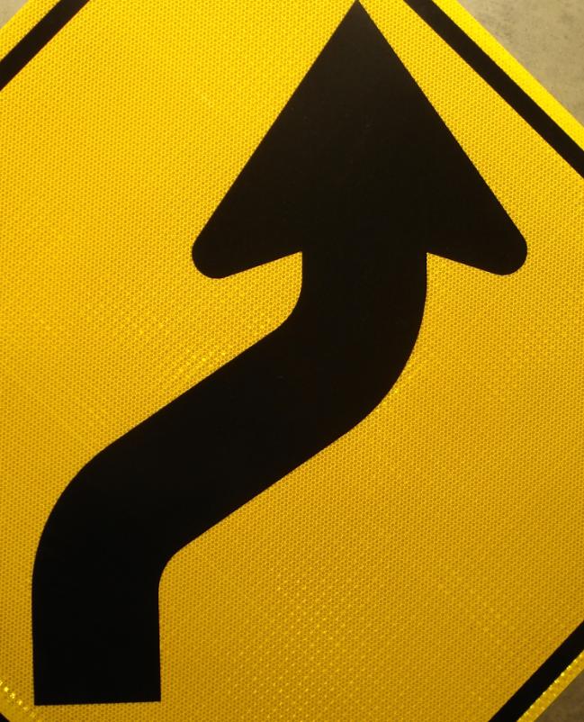 Detailed picture of our reverse curve right highway sign.