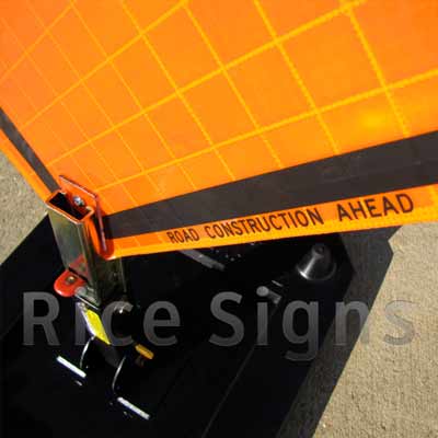 Up-close photo of the Road Construction Ahead sign with optional rubber sign stand (SKU# RURubber).