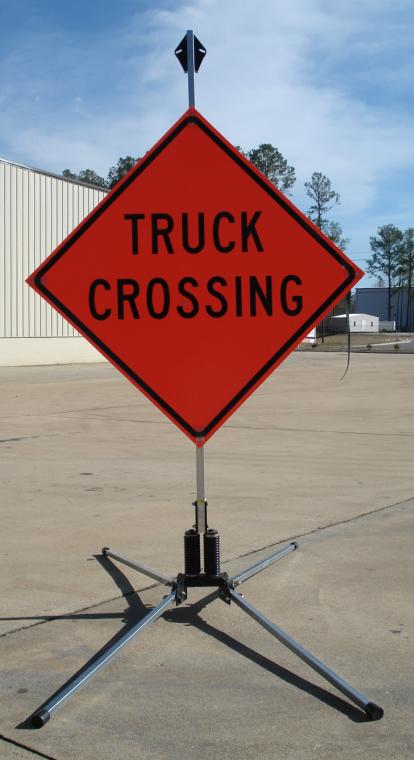 36 Inch Truck Crossing Roll Up Sign, Non Reflective - Shown with our RU5000 roll-up sign stand.