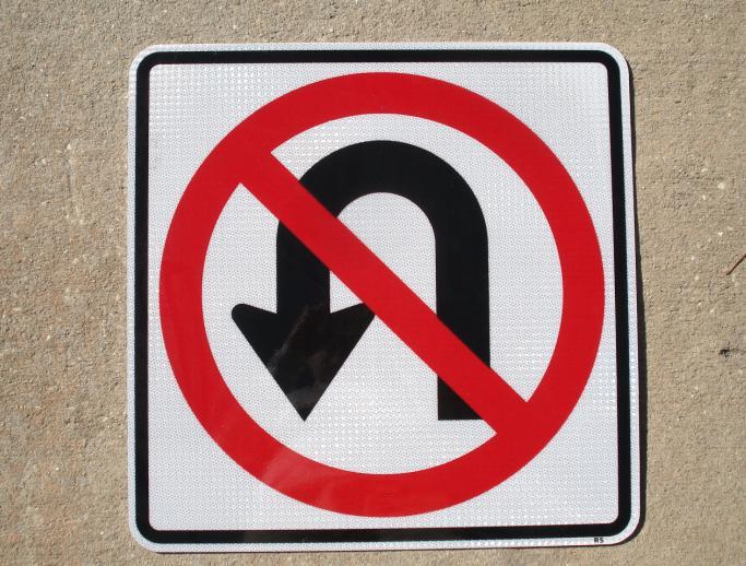 An actual picture of our No U Turns traffic sign.