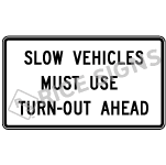 Slow Vehicles Must Use Turn-out Ahead Sign