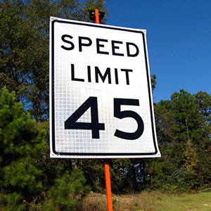 Speed limit 45 roll-up sign mounted on a sign stand.