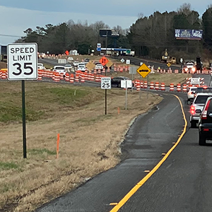 Speed limit signs in construction zone that show the speed reduced from 35 mph to 25 mph